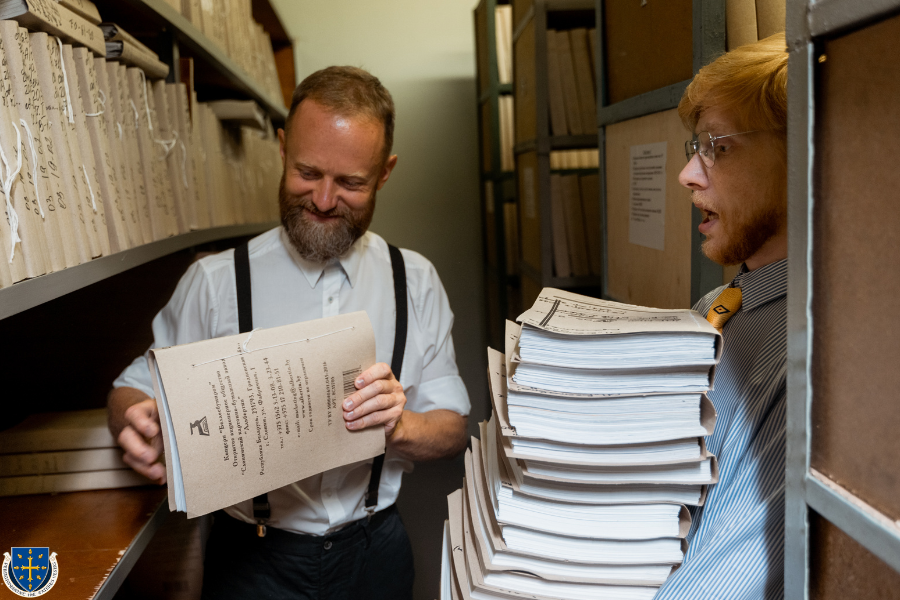 Genealogists working together on historical research.